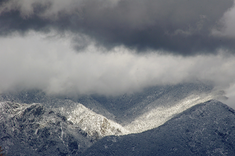 Taos Mountain in the snow and clouds