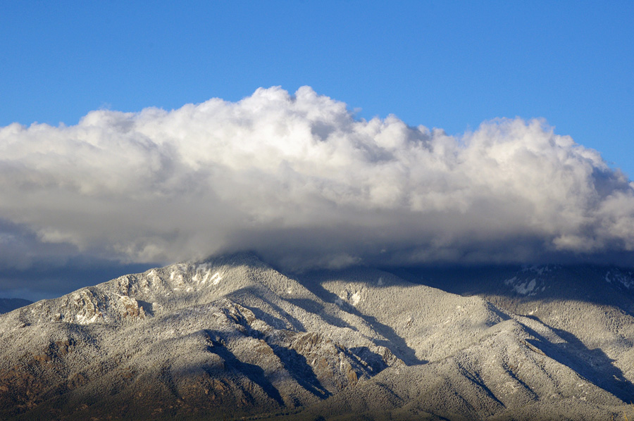 Taos Mountain in the snow and clouds