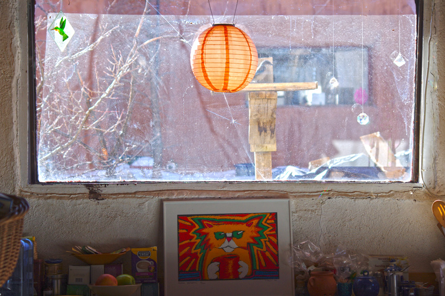 old adobe kitchen window in Taos, NM