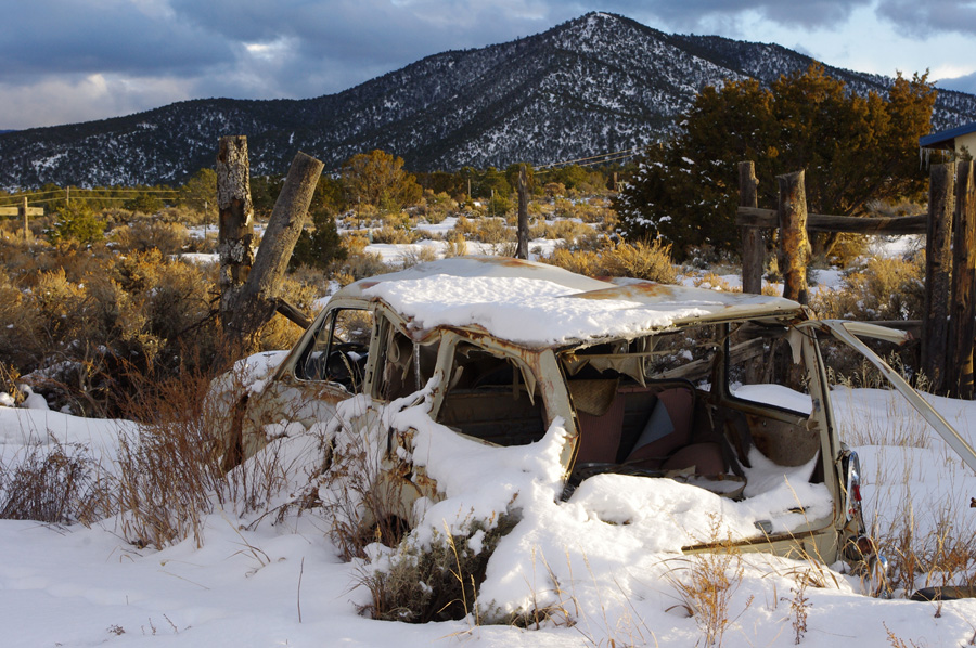 old wrecked VW in the snow in Taos