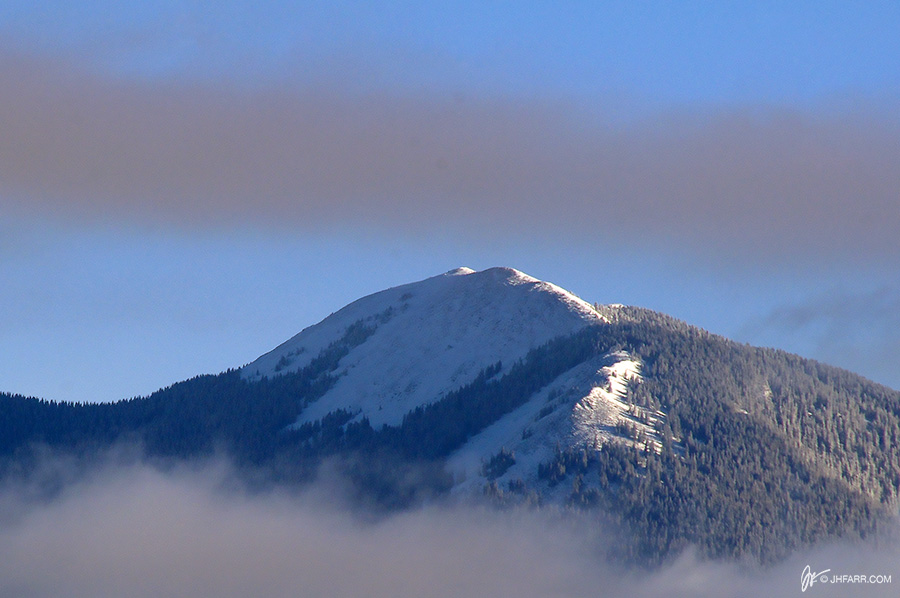 Taos Mountain in the snow and clouds