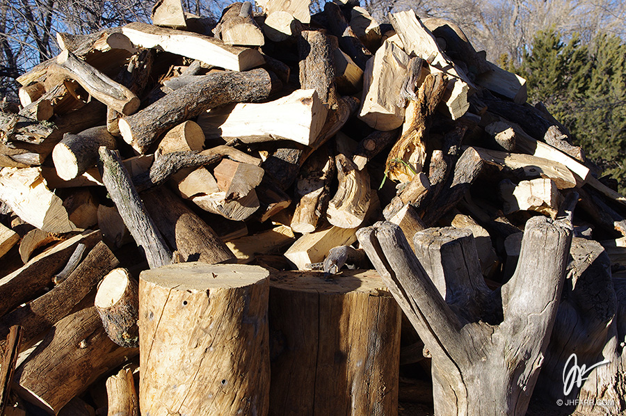 big wood pile in Taos