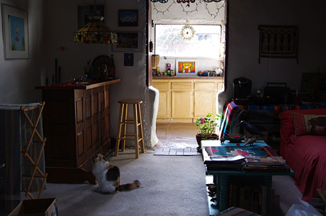 The room we call the saloon in our old adobe in Taos, New Mexico