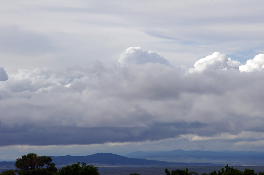 clouds sweeping over the rift valley west of Taos, NM