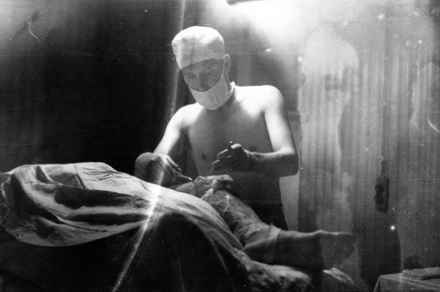 U.S. Army surgeon in operating room, WWII