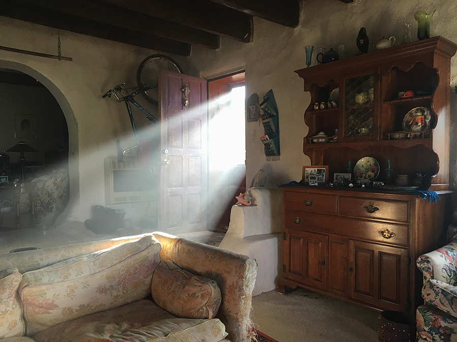 smoky light in old Taos adobe