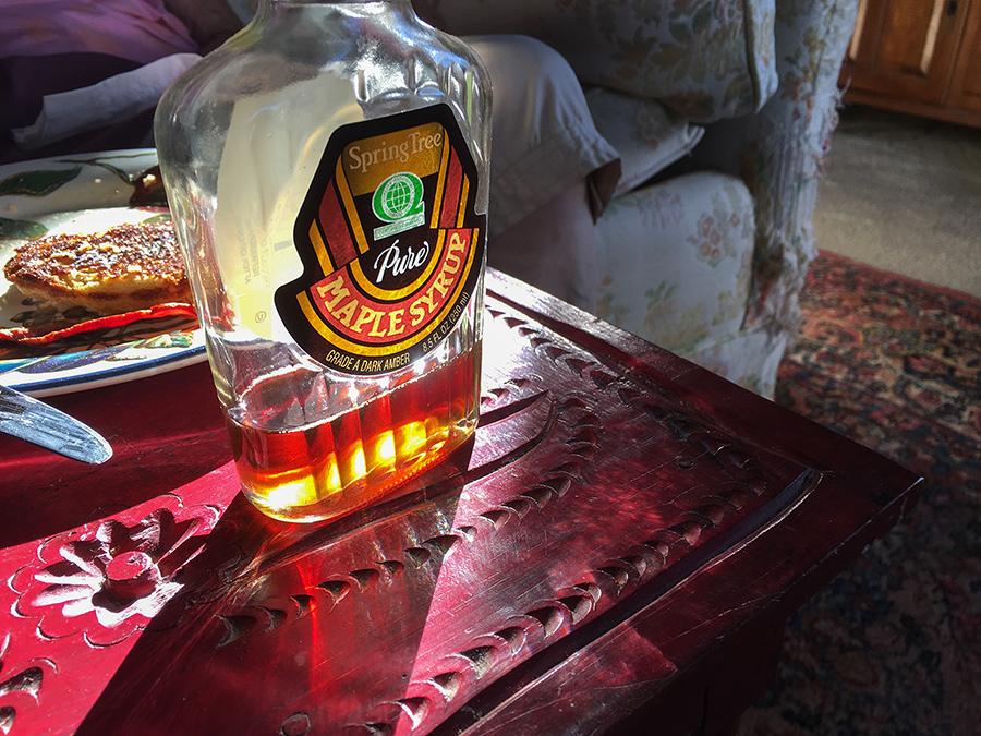 syrup bottle on a Mexican table in the sun